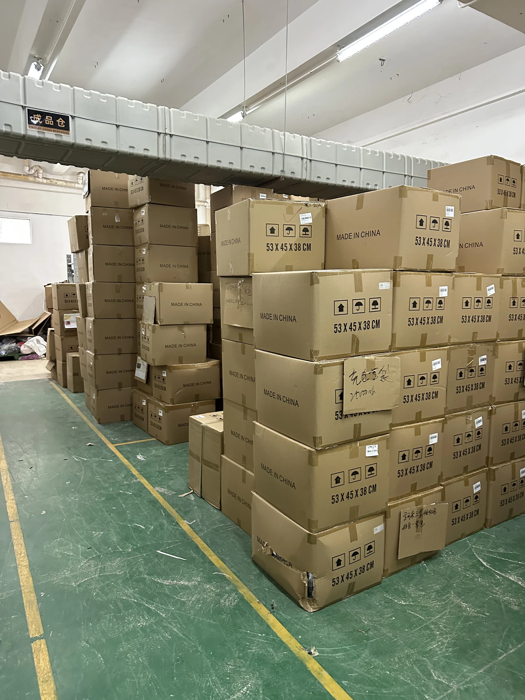 Real packed custom bag order in warehouse Owner-supplied photograph of packed custom bag cartons staged before dispatch